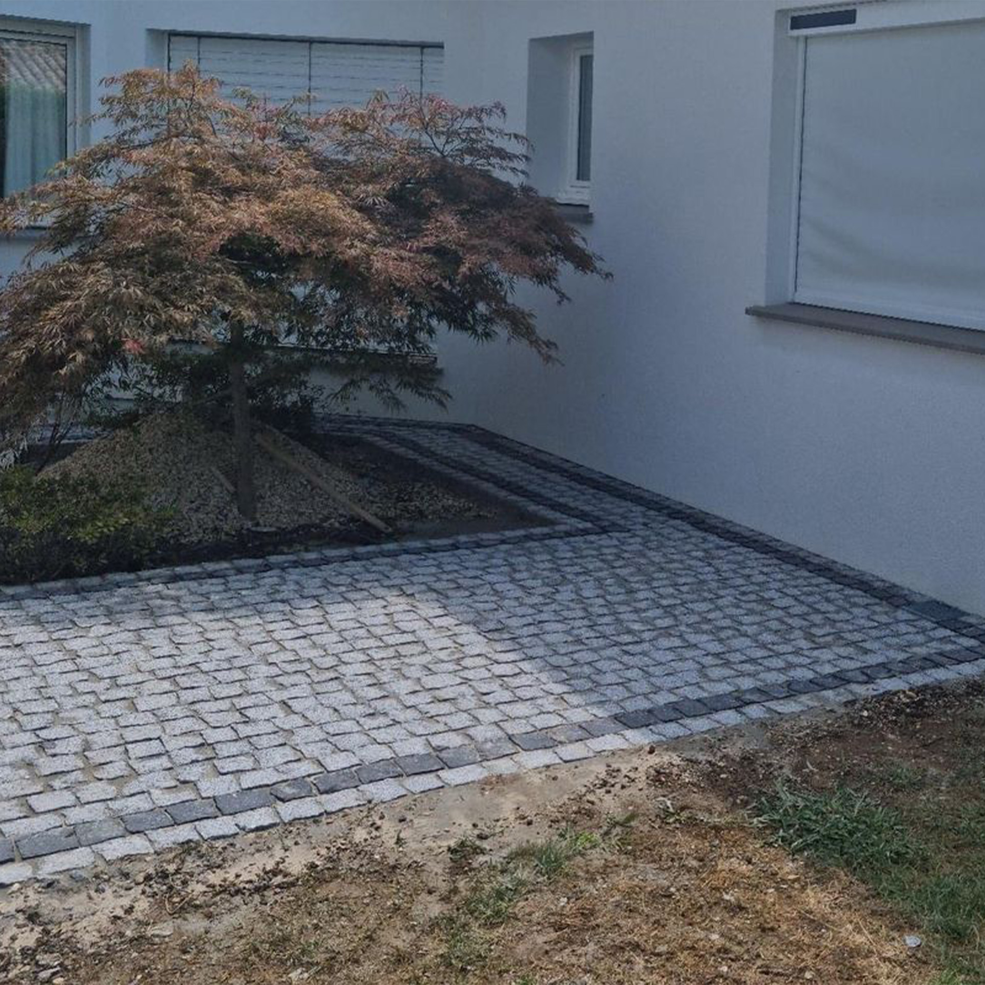 Pflasterstein – Granit Grau gespalten